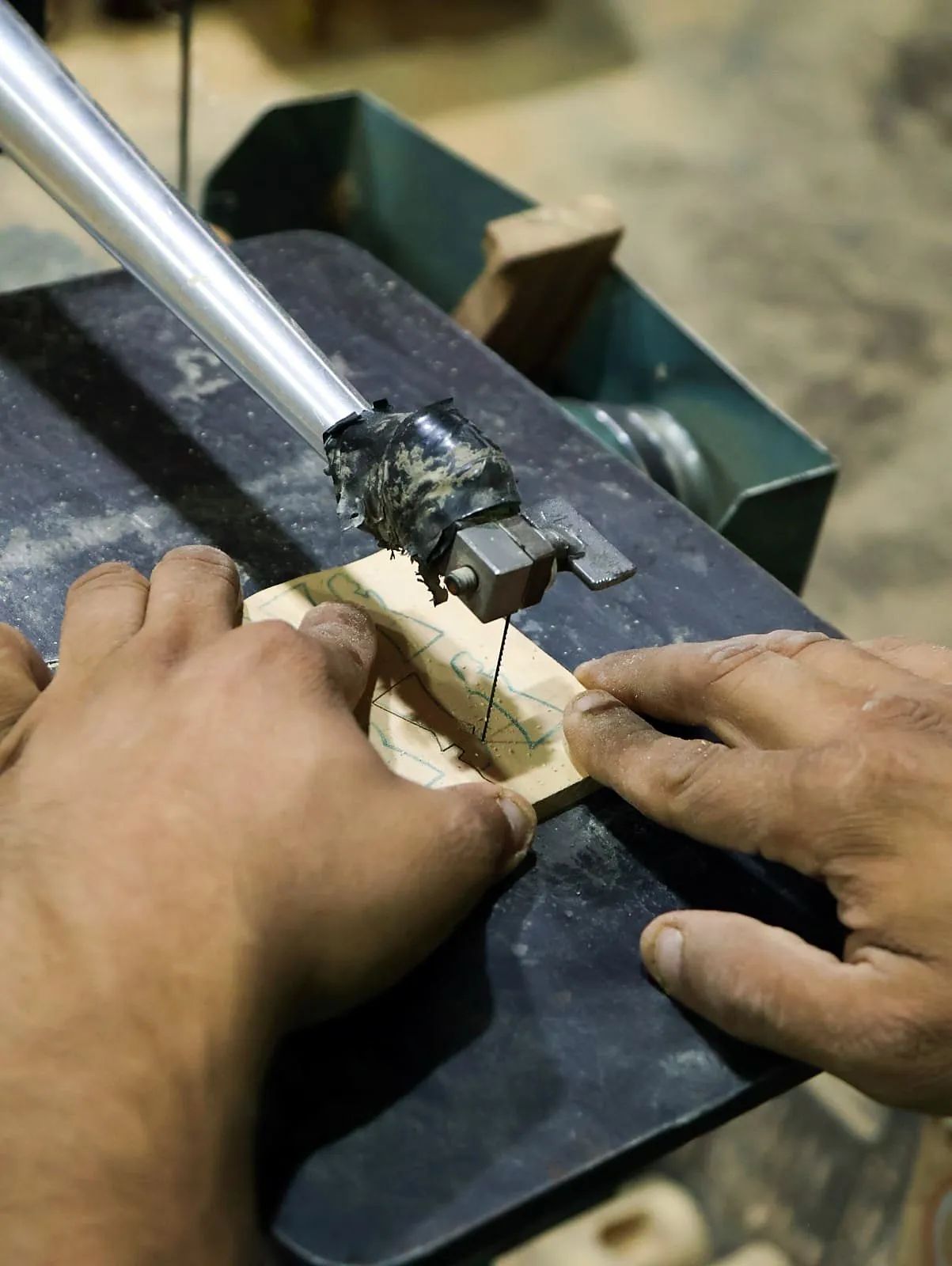 Olive wood being cut in our workshop